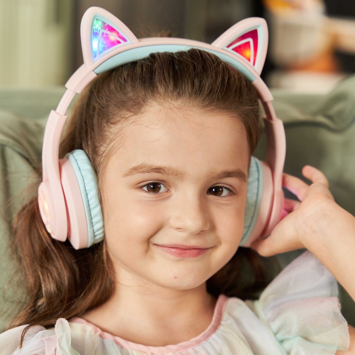 A girl wearing iClever Kids Headphones BTH13